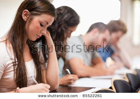 stock-photo-serious-students-listening-a-lecturer-in-an-amphitheater-85522261.jpg